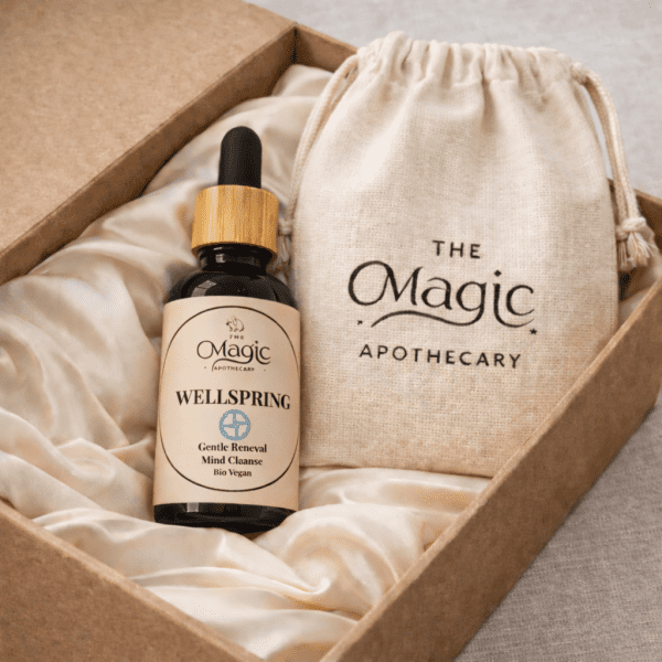 Wellspring, essential oil blend for gentle renewal, bottle detail, label visible, editorial styling, The Magic Apothecary