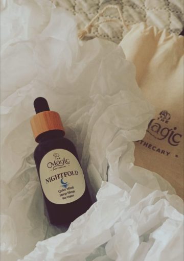 Nightfold essential oil bottle from The Magic Apothecary resting in soft tissue paper